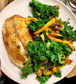 fish and kale on a plate